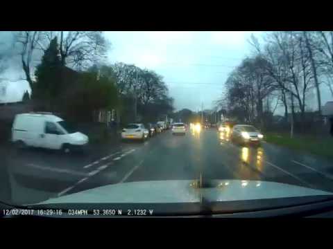 Blue Mini driving dangerously on Bury Road