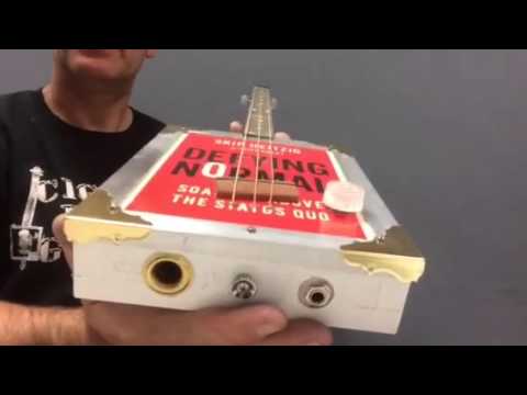 "Defying Normal"  with the "Cigar Box Guitar"