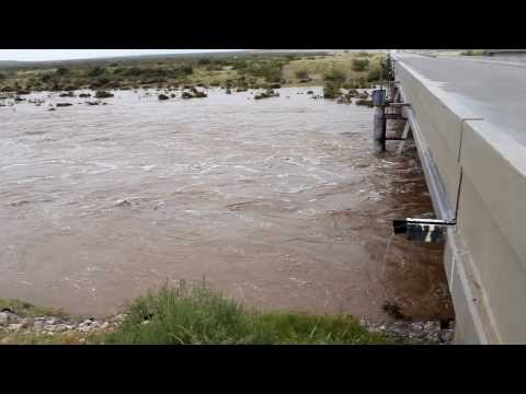 Flash Flooding On Rocky Arroyo - US Hwy 285 Bridge.  9 12 2013
