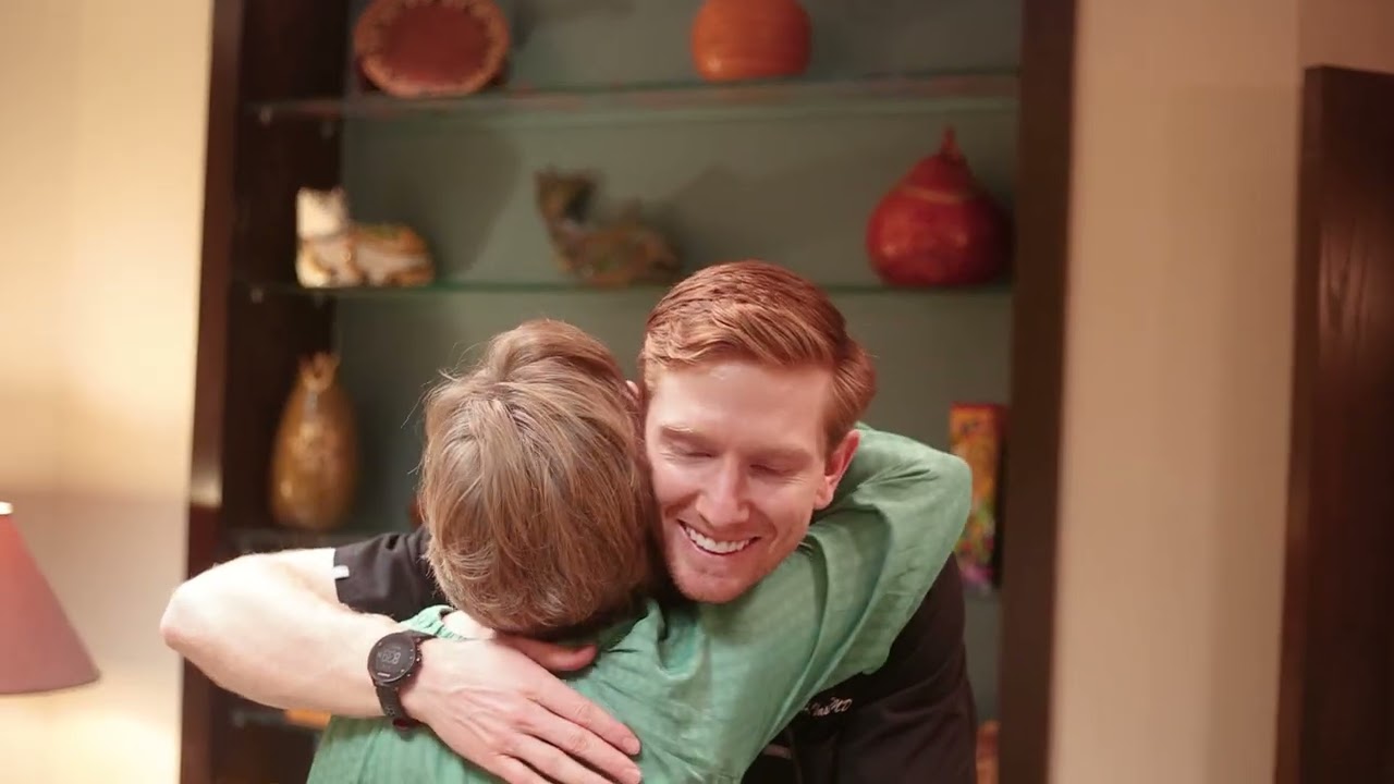 Buckhead Atlanta Georgia dentist hugging a dental patient