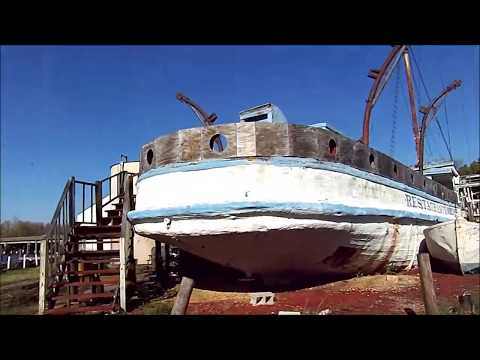100+ year old fishing boat turned restaurant, rotting away.