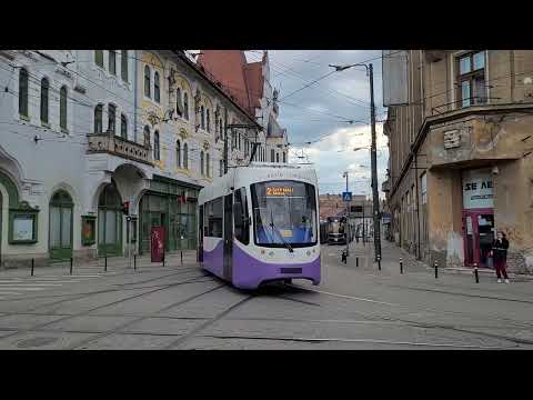Timişoara: Piaţa Traian. Trams nr. 1013 (route 6b), 14 (route 2)