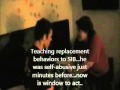Nurse And ABA Therapist With Severely Autistic Adult