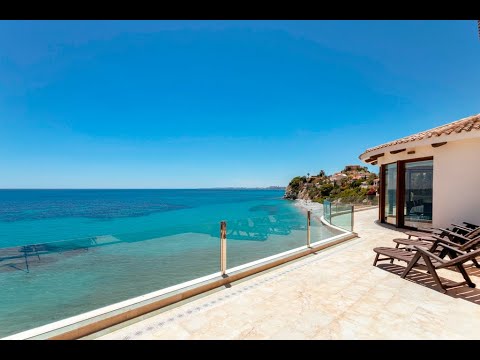 First line Villa Irene in El Campello with private access to the sea and impressive sea-coast views!