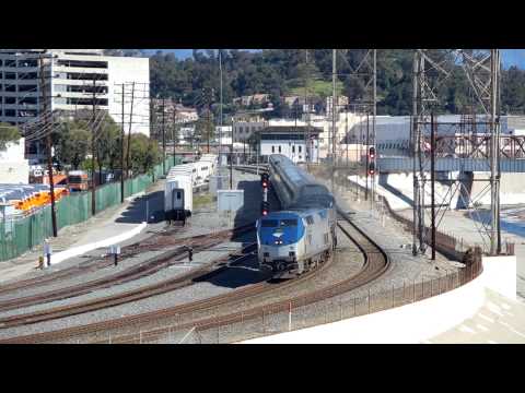 UP Trains, a CSX Engine, and PV Tioga Pass on the River Sub