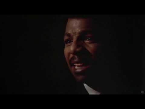 Rocky III trailer still: ring-walk lights on Rocky as music swells