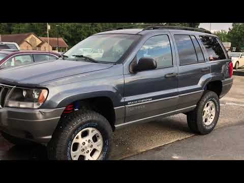 Installing the Rough Country 4 inch lift on the Jeep Grand Cherokee WJ lift kit
