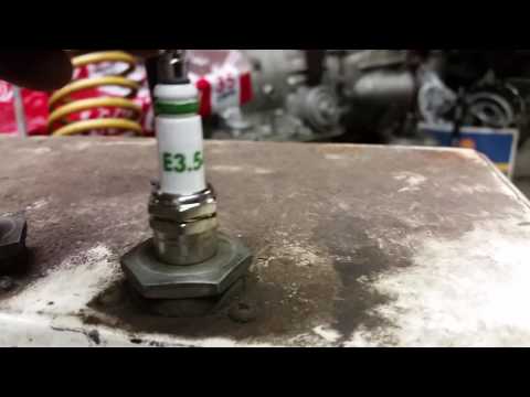 Comparing spark quality on Autolite XP vs. E3 spark plug.