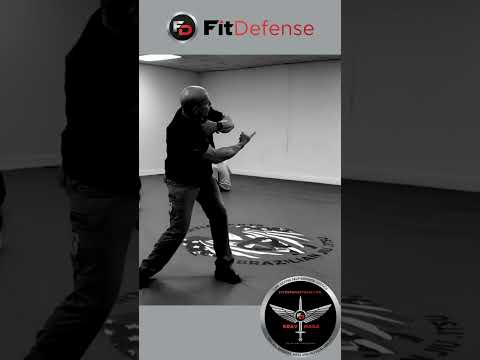 Krav Maga students learning how to throw from head control!