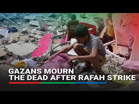 Gazans mourn the dead and search through rubble after Rafah strike