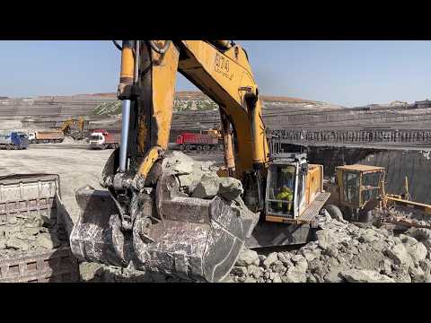 Liebherr 974 Excavator Loading Dump Trucks at a Massive Open-Pit Mine - Ascon LTD