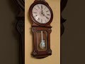 Rhythm Pendulum Wall Clock