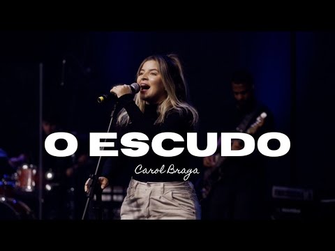 O Escudo - Carol Braga