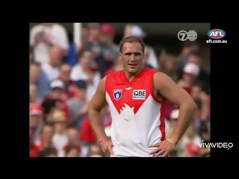 Tony "Plugger" Lockett kicks his AFL record breaking 1300th goal.