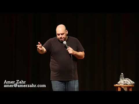 Watching the News - Amer Zahr