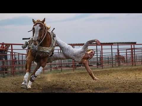 Shelby Pierson & Haley Proctor Trick Riding at the 100th Wolf Point Wild Horse Stampede