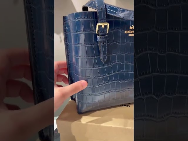 شنطة كوتش مولي باق بني 25