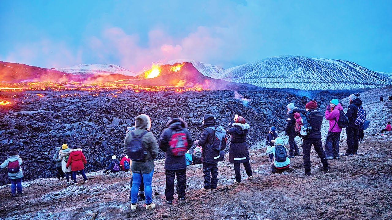 Watch Recordbreaking numbers of people visit Iceland's erupting volcano