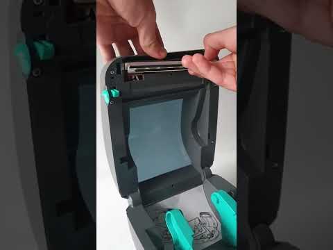 If Zebra GK420 print is smudged fix - Clean these black marks at the back of printhead