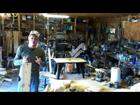 Finishing touches on the rustic cabin. tonuge and groove, trim and shutters