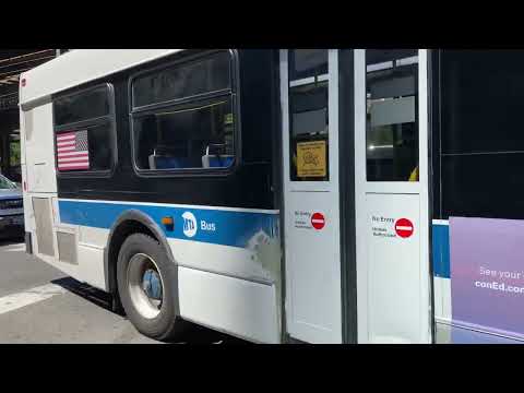 Main St bound Q66 on Queens Plaza S turning onto 28th St. (College Point Depot. C40LF #558)