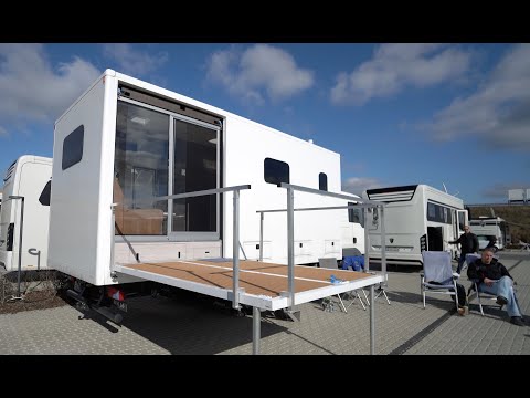 Most beautiful motorhome 2021: Lounge motorhome with veranda, huge kitchen, sofa, fold-down bed