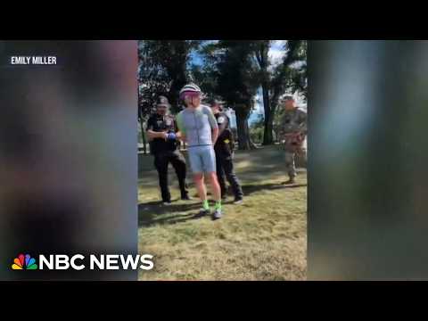 Olympian charged with damaging reflecting pool