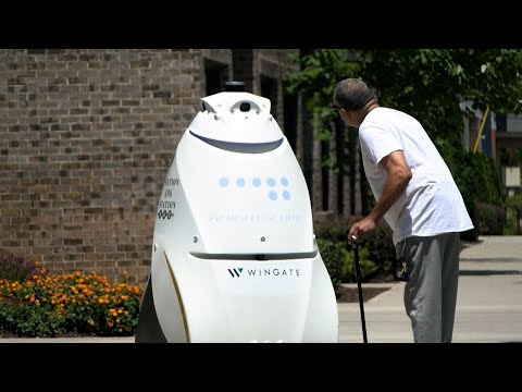 Security robot patrolling near Old Fourth Ward apartments