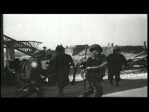 German troops march and French civilians in Pontaubault, France. HD Stock Footage