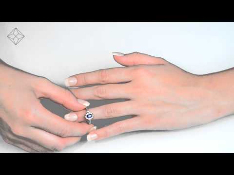 E5934 - Stunning 0.62ct Sapphire 0.08ct Diamond and 9K White Gold Ring