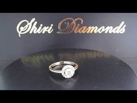 A video of Flower Halo Engagement Ring. A Central Diamond Surrounded By Diamonds