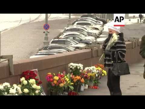 Floral tributes mark first anniversary of death