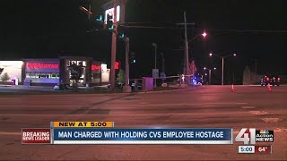 Man charged with holding CVS employee hostage