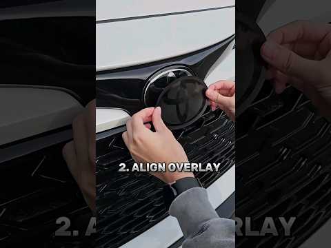 chrome delete on a 2023 Toyota Corolla hatchback ft. stealth vinyl emblem overlay
