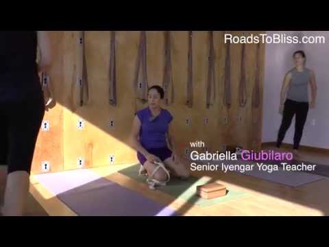 Gabriella Giubilaro teaching Pincha Mayurasana   in the Iyengar Tradition