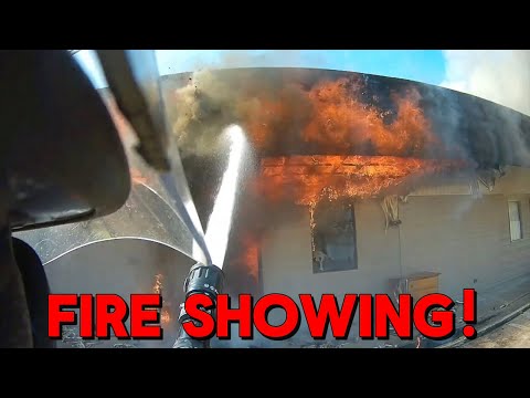 Helmet cam footage of house and motel fires. 