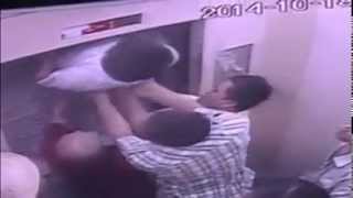 Chinese man almost cut in half by the lift he stuck in
