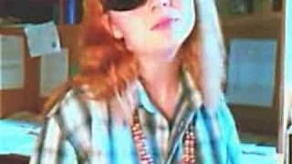 Big Noise New York - Phen distracts herself from puffy eyes.