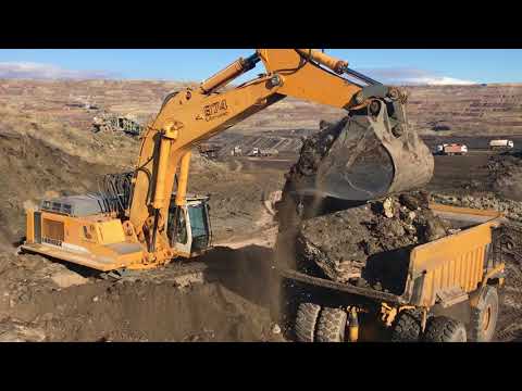 Liebherr 974 Excavator Loading Caterpillar 773 Dumper