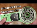 Integrated arm harmonic drive system.