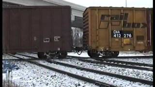 preview picture of video 'Amtrak Empire Builder #8@Grand Crossing in 1993+BN freight changing crews'