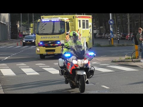 Politiemotoren begeleiden Mobiele Intensieve Care Unit 13-302 met spoed naar het Erasmus MC