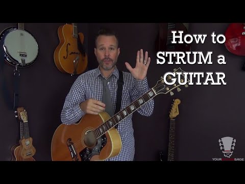 How to Strum a Guitar Correctly - Beginner Lesson