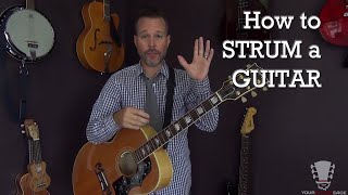 How to Strum a Guitar Correctly - Beginner Lesson