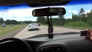 A line of corvettes on the highway
