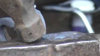 preview picture of video 'FORGE DEMO AT A LOCAL COUNTRY SHOW, BLACKSMITH FORGING A HOOK.'