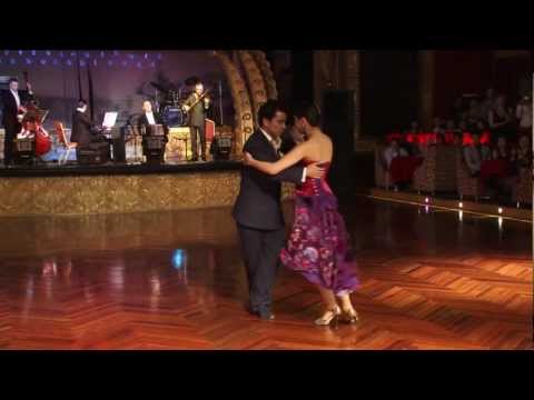  Sebastian Achaval  and  Roxana Suarez  are  dancing  to  a  tango  at  Shanghai Tango Marathon  in  2012