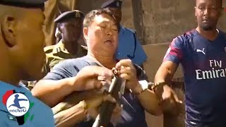 Chinese Man Grabs a Police Gun During His Arrest in Kenya