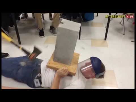 Physics experiment goes wrong as teacher hits co-worker with axe 2015-04-02