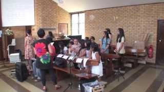 Maidstone Filipino Children Choral Group singing roll over the ocean
